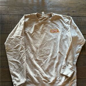 RedWest Music Festival cream sweater.